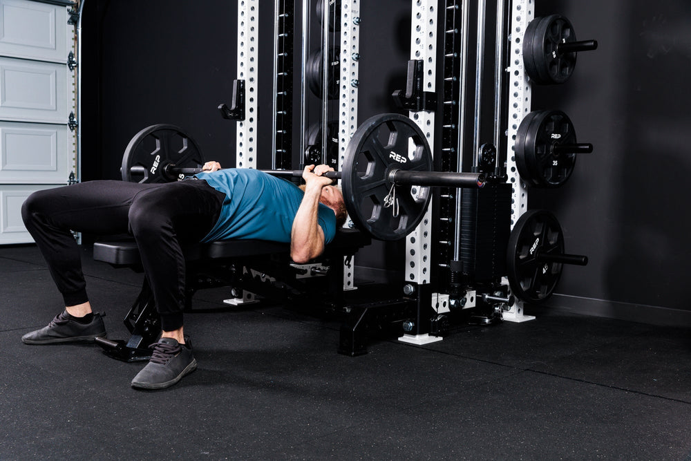 Athlete does a bench press.