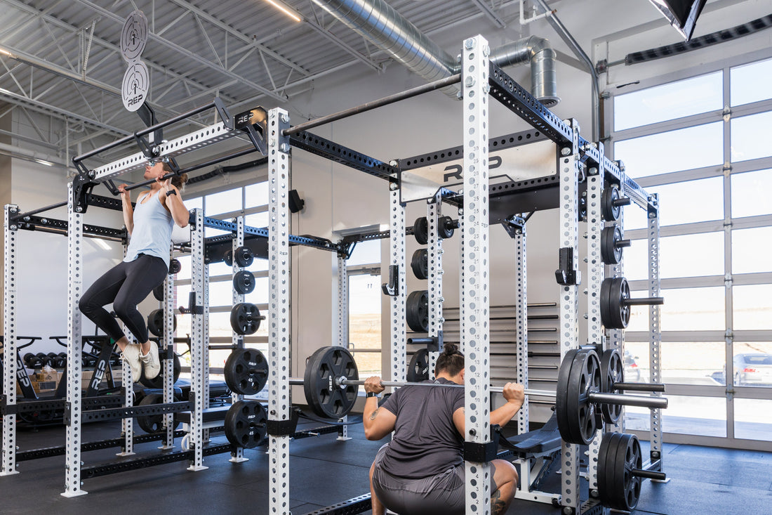 Two athletes work out.