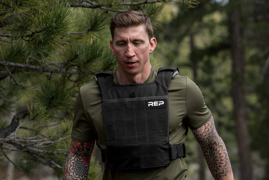 Athlete hikes with the Strata™ Weight Vest.