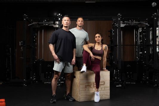 Athletes pose in REP apparel.