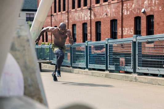Athlete sprints in REP apparel.