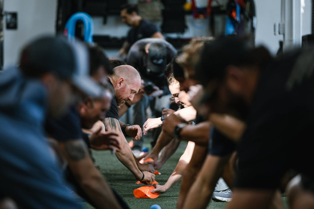 Athletes train at an O2X event with REP Fitness.
