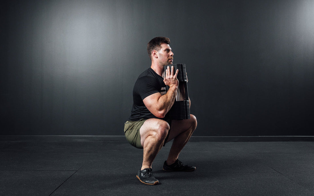 Athlete squats.