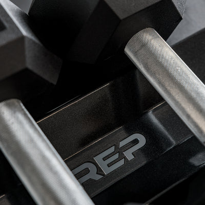 Close-up of the branding on the REP Fitness Commercial Dumbbell Rack