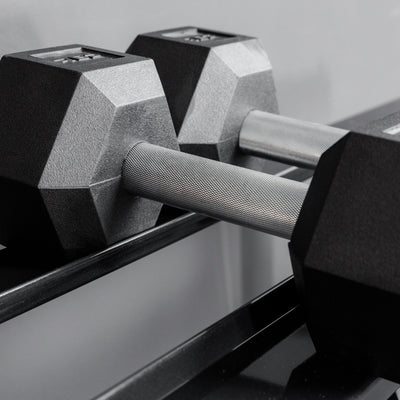 Close-up shot of hex dumbbells racked on the REP Fitness Dumbbell Rack 2.0