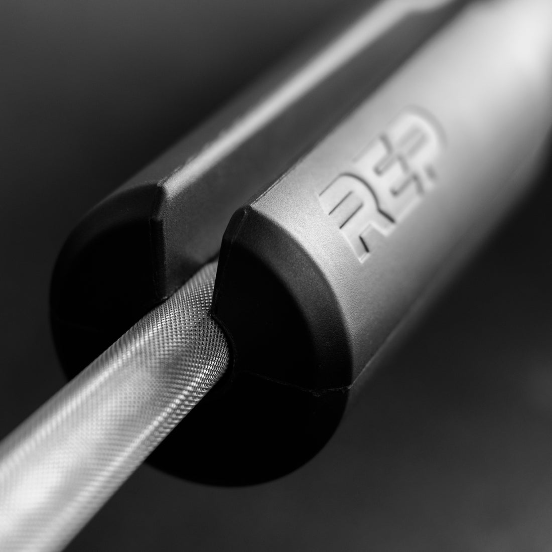 REP Fitness Hip Thrust pad on a barbell