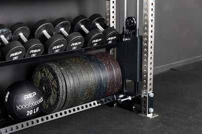 REP Fitness 82in Commercial Medicine Ball and Bumper Plate Shelf installed on 5000 series uprights