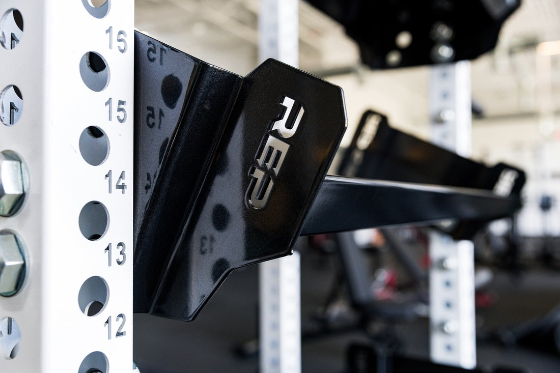 Close-up of the branding on a REP Fitness 41in Dumbbell & Kettlebell Shelf