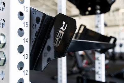Close-up of the branding on a REP Fitness 41in Dumbbell & Kettlebell Shelf