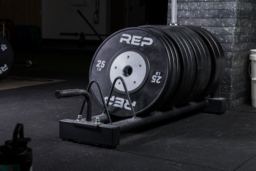 Black Competition Bumper Plates (LB) stored in a Horizontal Plate Rack
