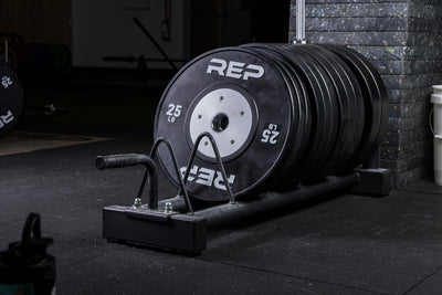 Black Competition Bumper Plates (LB) stored in a Horizontal Plate Rack