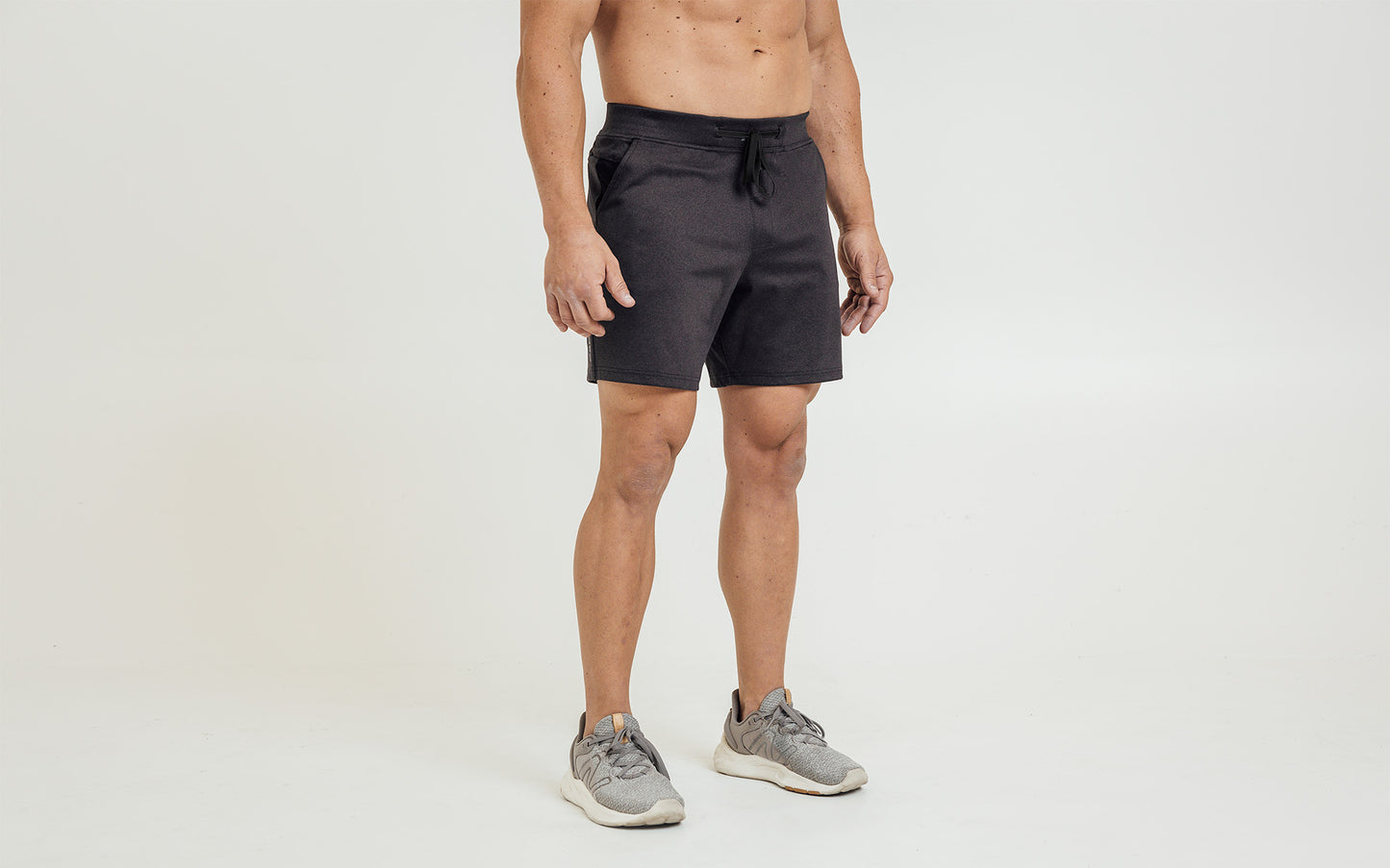 The REP Fitness Men's Versa Shorts in Heather Black on body