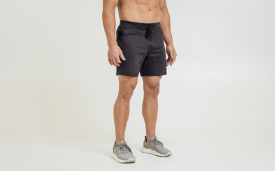 The REP Fitness Men's Versa Shorts in Heather Black on body