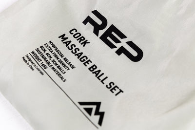 Close-Up: REP Cork Massage Ball Set product details printed on the drawstring carrying bag.