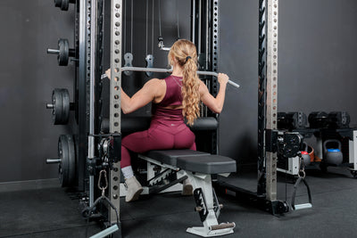 Athlete doing lat pulldowns with the REP Fitness Altitude™ Power Rack Cable Attachment