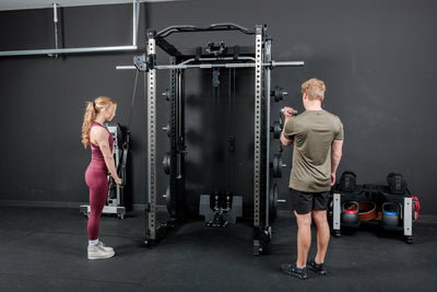 Two athletes using the REP Fitness Altitude™ Cable Machine Attachment at the same time
