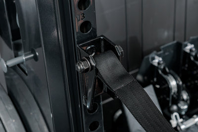 Close-up shot of the REP Fitness Altitude™ Power Rack Strap Safeties on the uprights