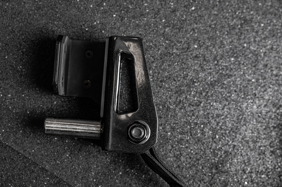 Close-up of the REP Fitness Altitude™ Power Rack Strap Safeties rack attachment hardware