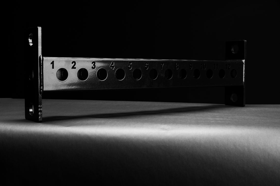 Close-up of the new 26" crossmember that allows both the Athena and Smith Machine Rack Attachment on a 4-Post rack.