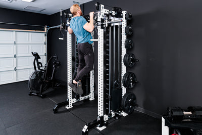 Person performing pull-ups on the Summit™ All-In-One Athena™ .