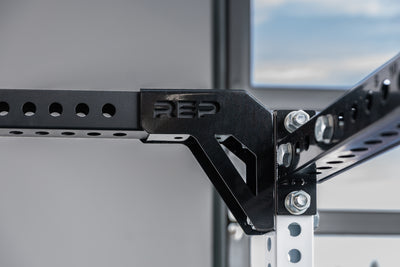 The REP Fitness Rack Crossmember Connectors installed to the side of a PR-5000 rack