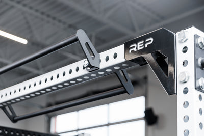 The REP Fitness Rack Crossmember Connectors installed between two PR-5000 racks
