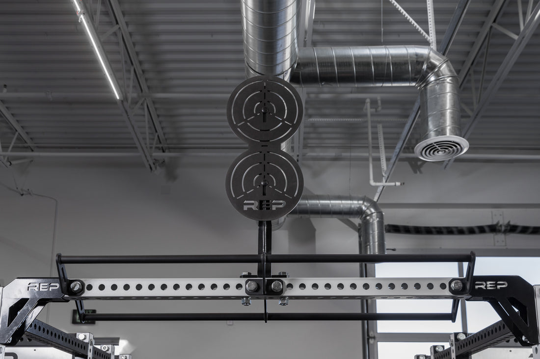 The REP Fitness Crossmember Mount Wall Ball Target on an 82 inch crossmember