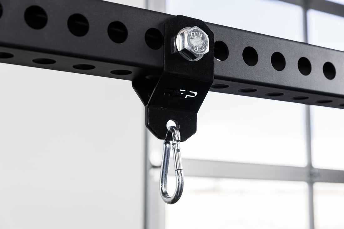 The REP Fitness Rack Crossmember Connectors with a shackle installed