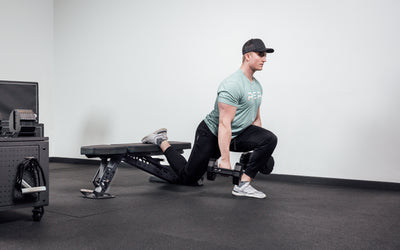 Joe doing bulgarian split squats on bench