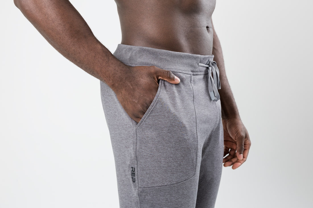 The REP Fitness Men's Apollo Joggers in Heather Cool Gray front, side pocket detail
