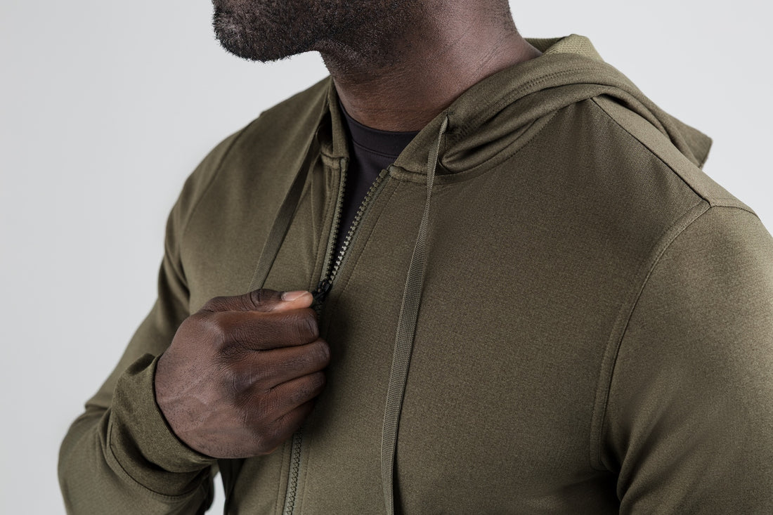 The REP Fitness Men's Attis Jacket in Heather Olive front, zipping up detail