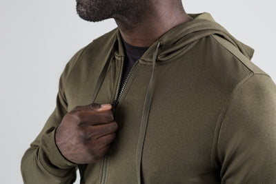 The REP Fitness Men's Attis Jacket in Heather Olive front, zipping up detail