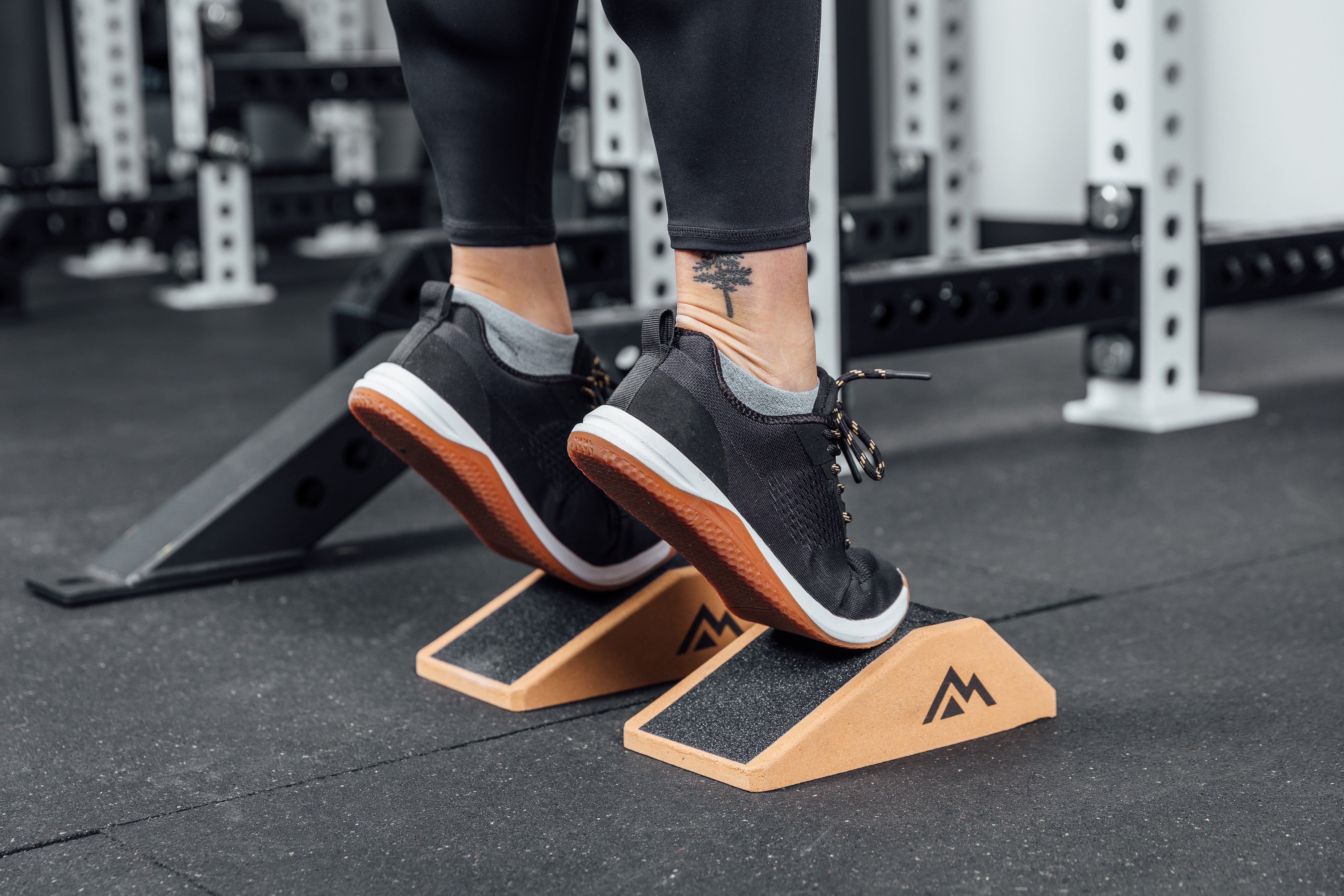 Athlete on their toes on the Cork Squat Wedge