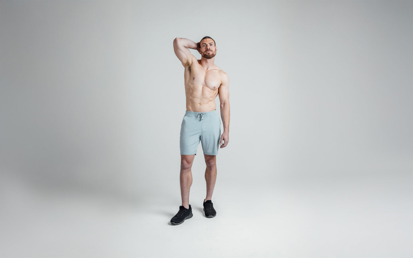 The REP Fitness Men's Versa Shorts in Heather Dusty Blue on body