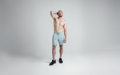 The REP Fitness Men's Versa Shorts in Heather Dusty Blue on body
