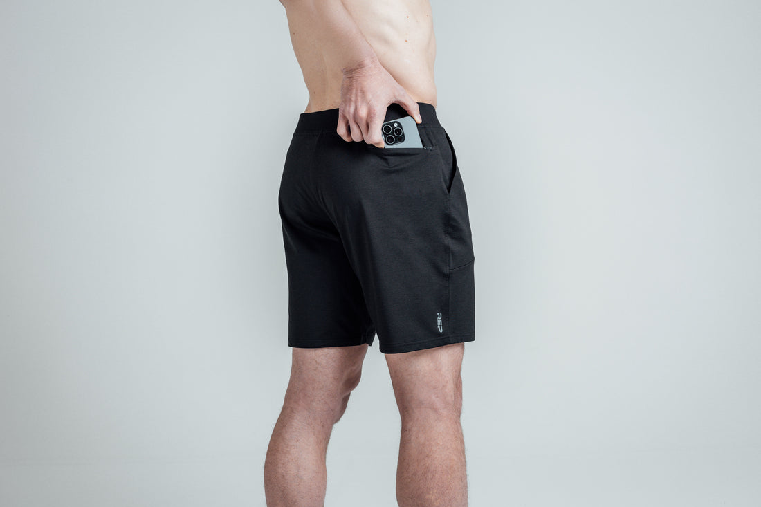 The REP Fitness Men's Apollo Shorts in Heather Black/Cool Gray back, pocket close-up
