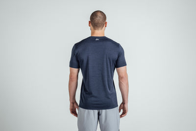 Back view of an athlete wearing Heather Navy Sigmatech Shirt