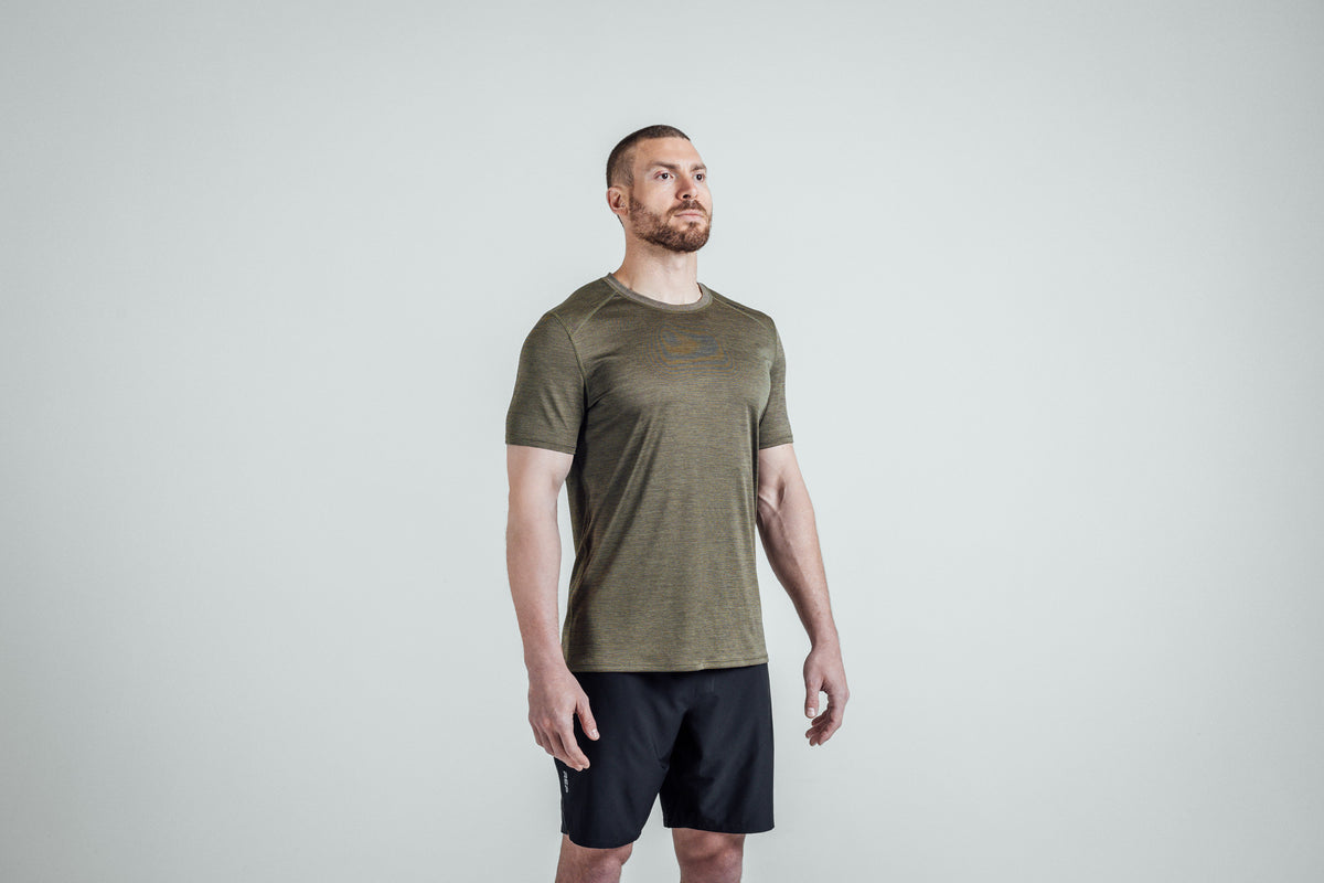 Athlete wearing Heather Olive Sigmatech Shirt