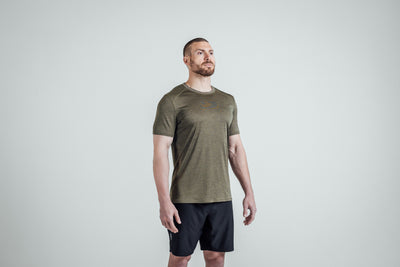Athlete wearing Heather Olive Sigmatech Shirt