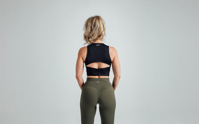 Back shot of an athlete wearing the REP Rhea Tank in Black