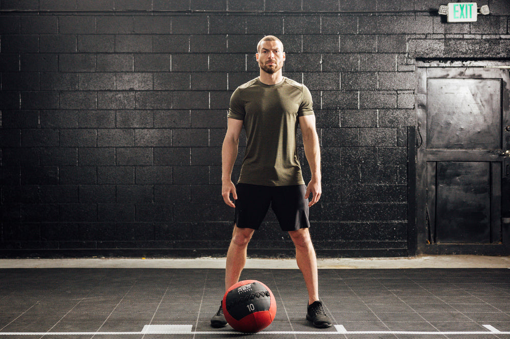 Athlete wearing black Men's Motus Shorts