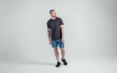 Athlete wearing Heather Black Sigmatech Shirt