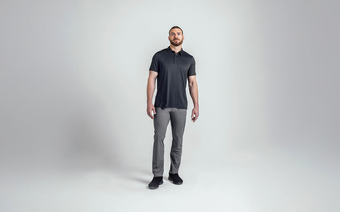 The REP Fitness Men's Audax Performance Polo in Heather Black/Cool Gray front
