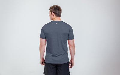 The REP Fitness Men's Daily Driver 2.0 USA Tri-Blend Crew T-Shirt in Heather Navy/White back, on model