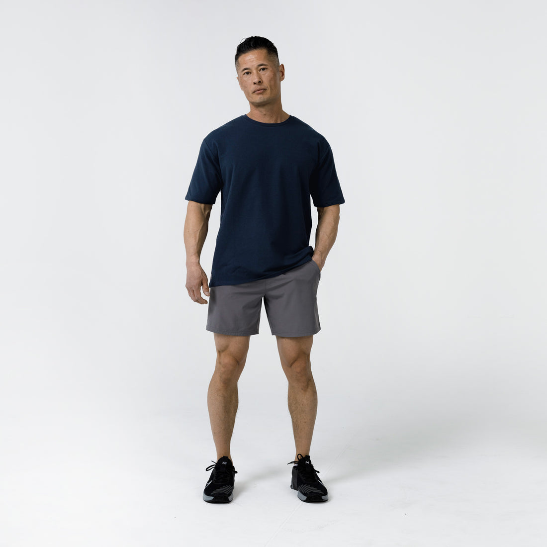 The REP Fitness Men's Magnis Heavyweight T-Shirt in Navy front on body shot