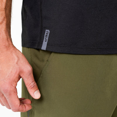 The REP Fitness Men's Aerix Tee in Heather Black front, hem detail