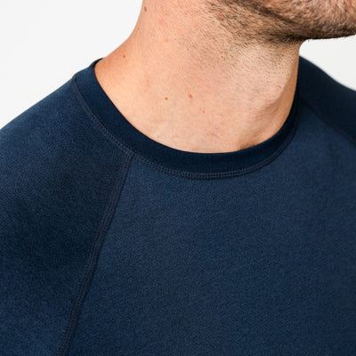 The REP Fitness Men's Aerix Tee in Heather Navy front, collar close-up