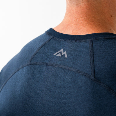 The REP Fitness Men's Aerix Tee in Heather Navy back, close-up