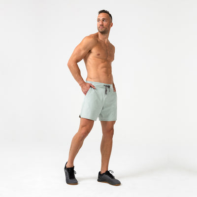 The REP Fitness Men's Pinnacle Shorts in Aqua on body, pocket detail