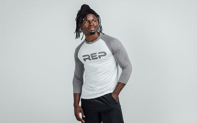 The REP Fitness Men's Daily Driver ¾ Sleeve Tri-Blend Crew T-Shirt in White/Gray on body